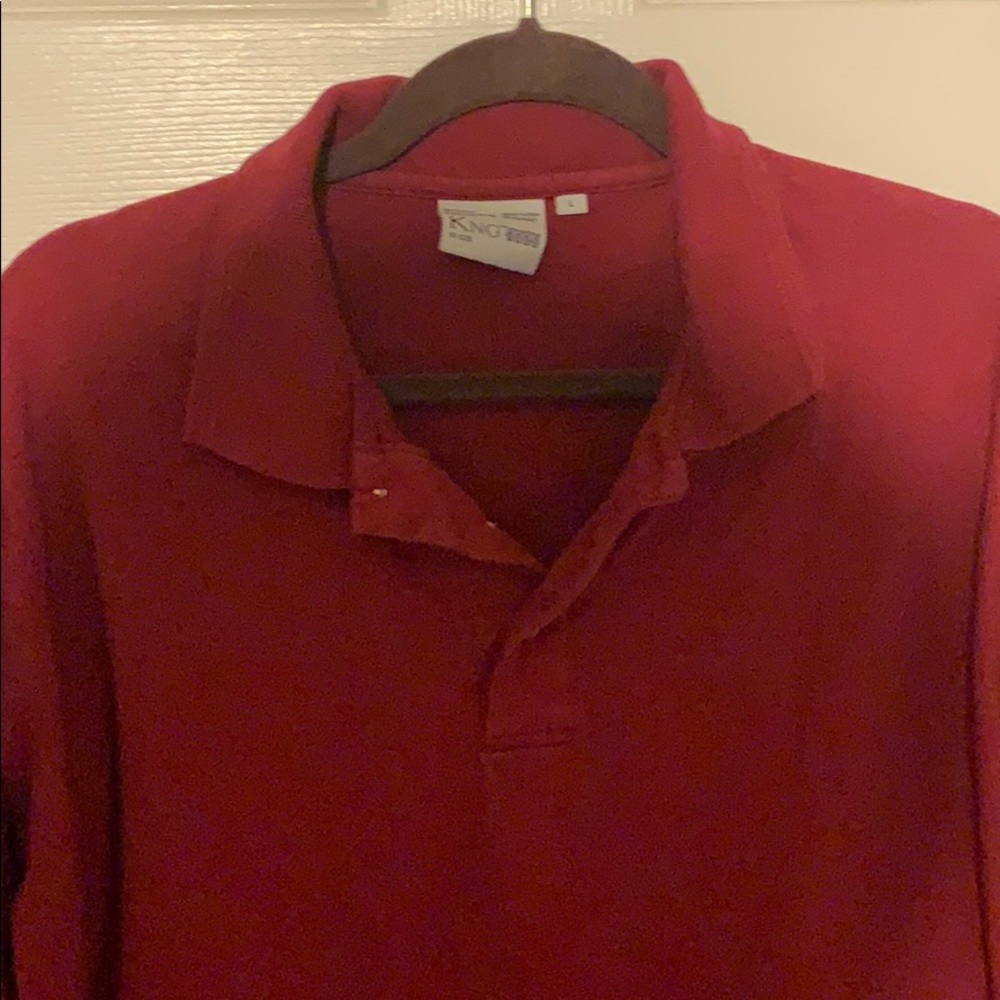 Men’s short Sleeve KNG Polo, Burgundy in color.